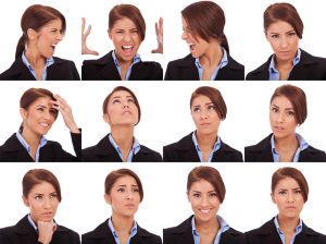 Collage of young business  woman's  different facial expressions